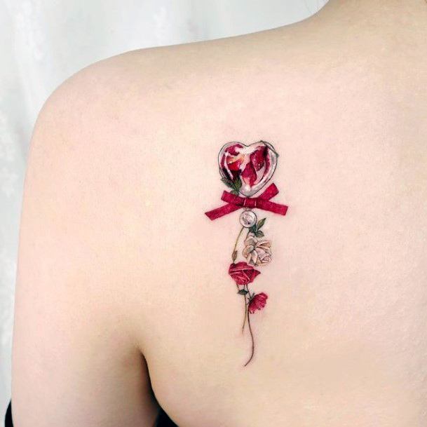 Woman With Fabulous Bow Tattoo Design