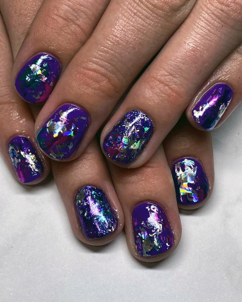 Woman With Fabulous Broken Shattered Glass Nail Design