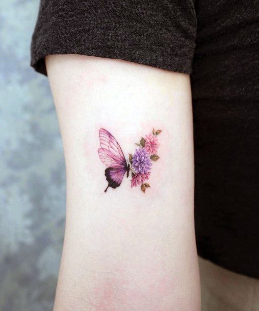 Woman With Fabulous Butterfly Flower Tattoo Design