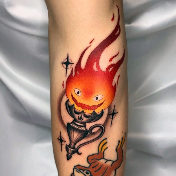 Woman With Fabulous Calcifer Tattoo Design
