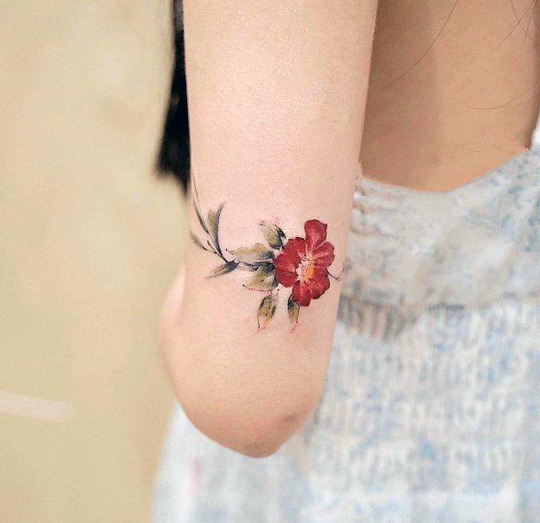 Woman With Fabulous Camellia Tattoo Design