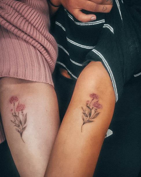 Woman With Fabulous Carnation Tattoo Design