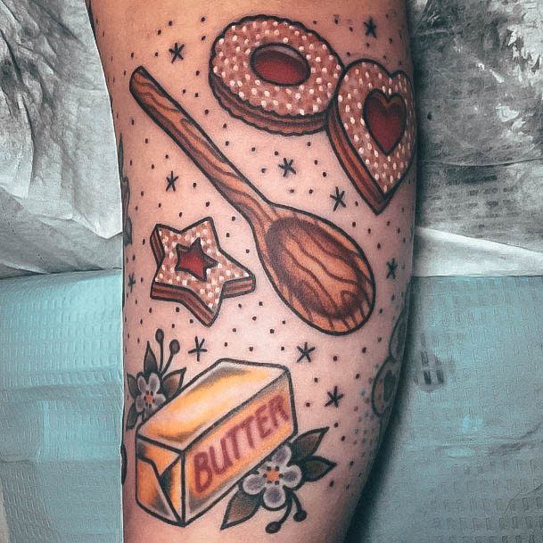 Woman With Fabulous Cookie Tattoo Design