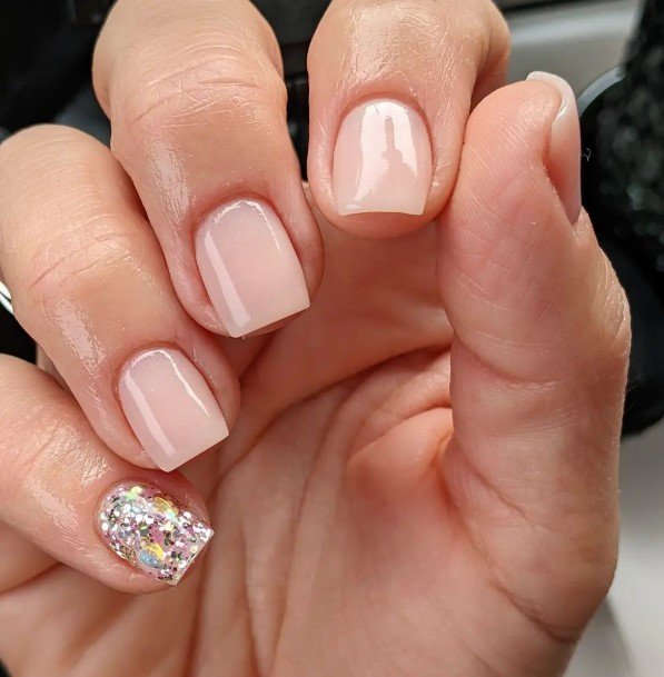 Woman With Fabulous Cream Nail Design