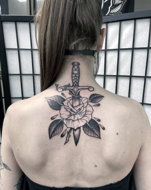 Woman With Fabulous Dagger Rose Tattoo Design