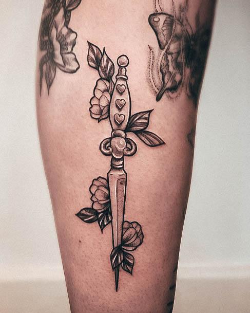Woman With Fabulous Dagger Tattoo Design