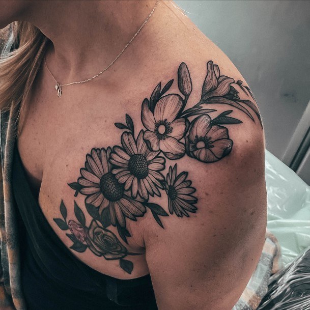 Woman With Fabulous Daisy Tattoo Design