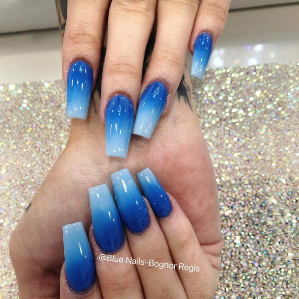 Woman With Fabulous Dark Blue Ombre Nail Design