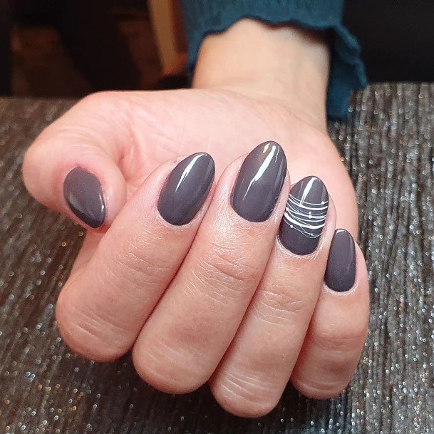 Woman With Fabulous Dark Grey Nail Design