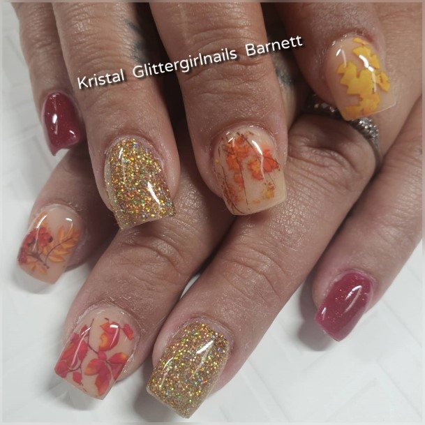 Woman With Fabulous Fall Leaf Nail Design