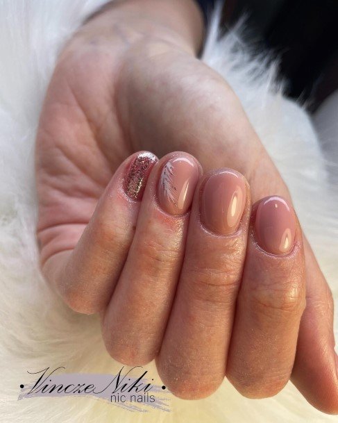 Woman With Fabulous Feather Nail Design