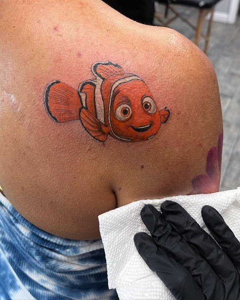 Woman With Fabulous Finding Nemo Tattoo Design