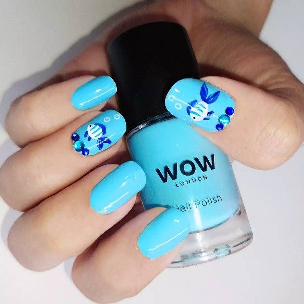 Woman With Fabulous Fish Nail Design