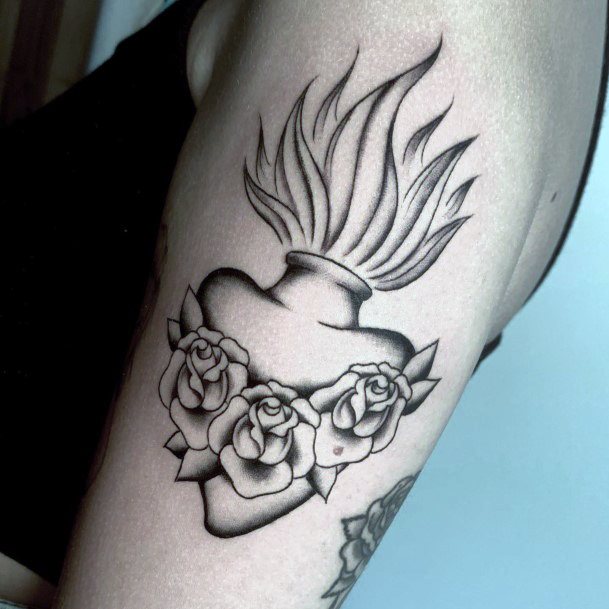 Woman With Fabulous Flaming Heart Tattoo Design