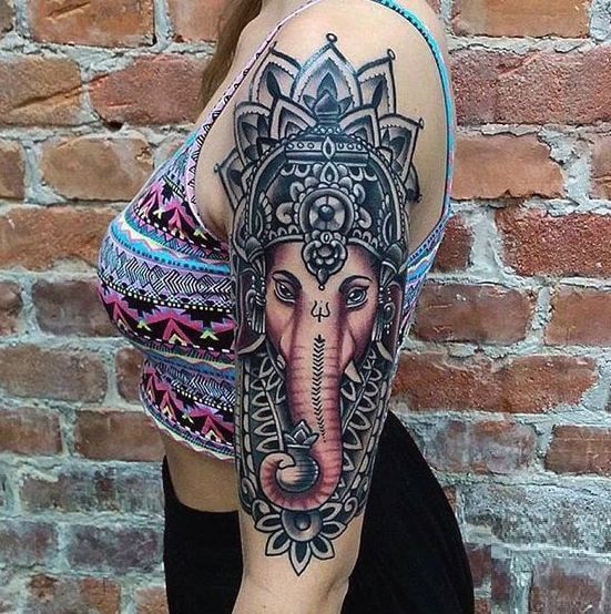 Woman With Fabulous Ganesha Tattoo Design