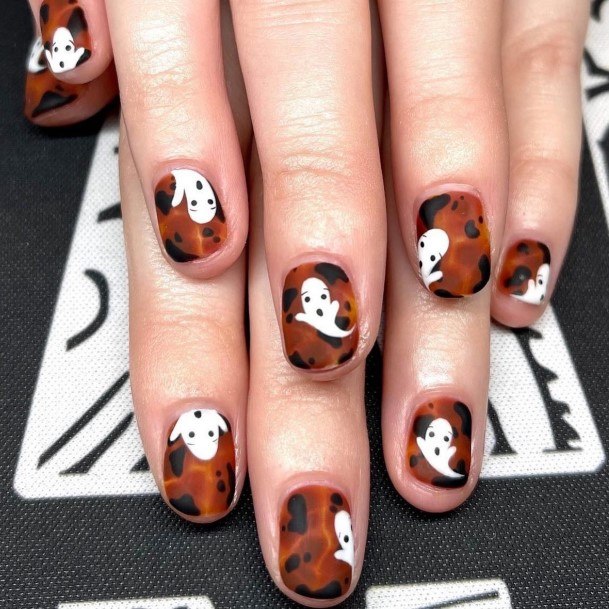 Woman With Fabulous Ghost Nail Design
