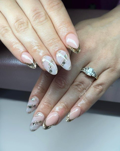 Woman With Fabulous Gold Nail Design