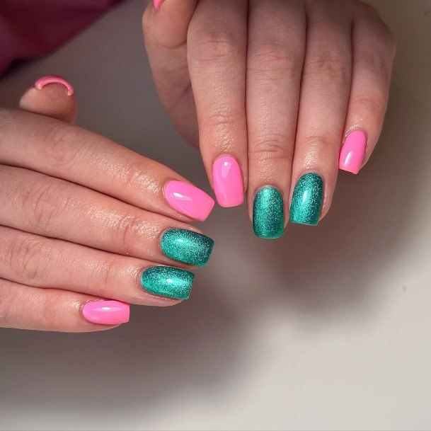 Woman With Fabulous Green And Pink Nail Design