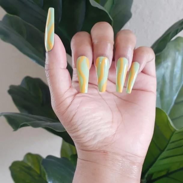 Woman With Fabulous Green And Yellow Nail Design