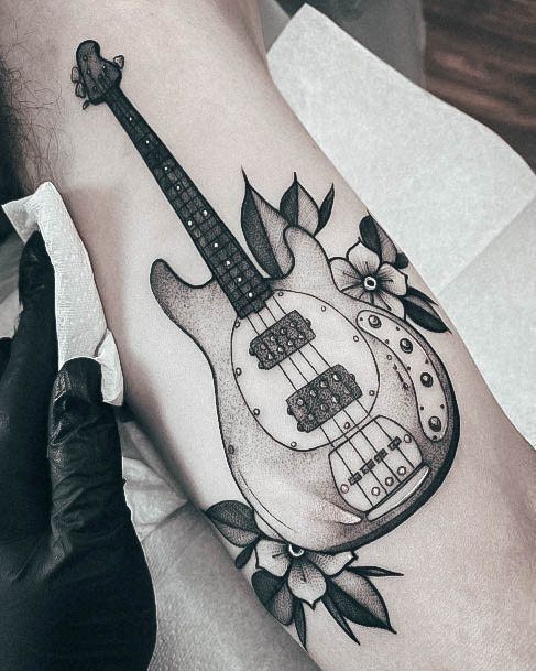 Woman With Fabulous Guitar Tattoo Design