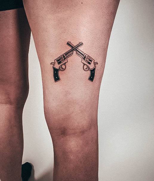 Woman With Fabulous Gun Tattoo Design