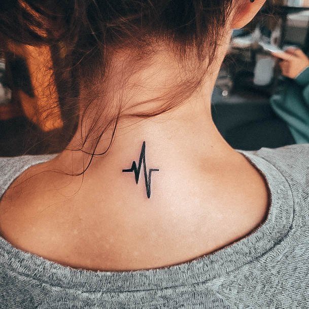 Woman With Fabulous Heartbeat Tattoo Design