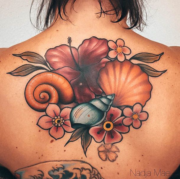 Woman With Fabulous Hibiscus Tattoo Design