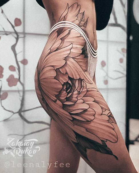 Woman With Fabulous Hip Tattoo Design