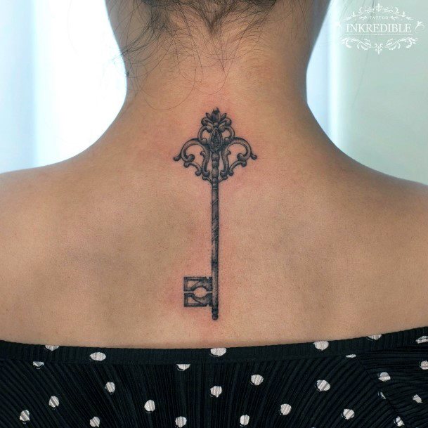 Woman With Fabulous Key Tattoo Design