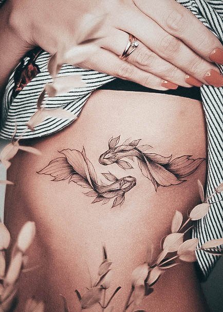 Woman With Fabulous Koi Fish Tattoo Design