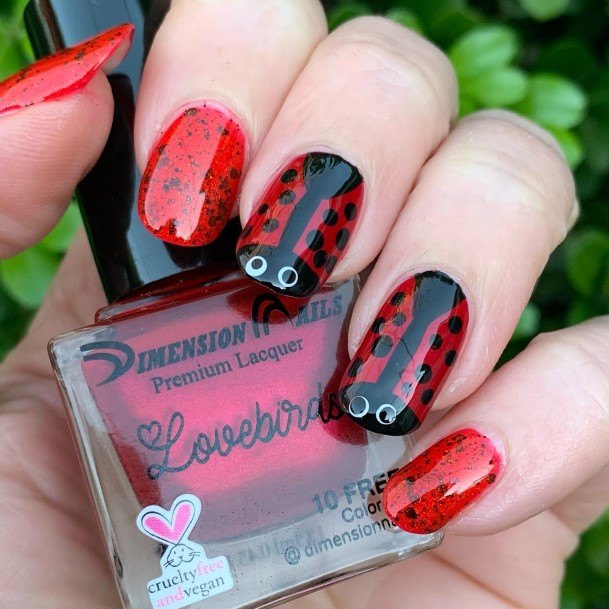 Woman With Fabulous Ladybug Nail Design