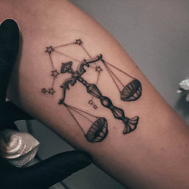 Woman With Fabulous Libra Tattoo Design