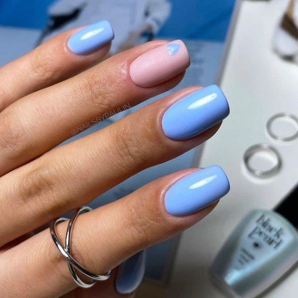 Woman With Fabulous Light Blue Nail Design