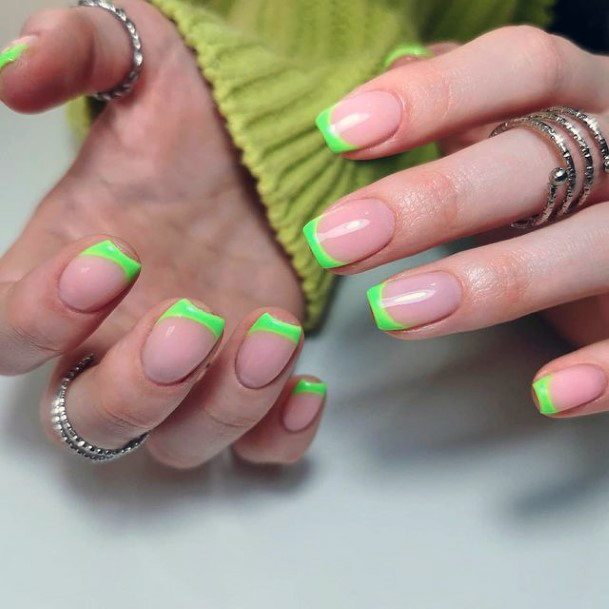 Woman With Fabulous Light Green Nail Design