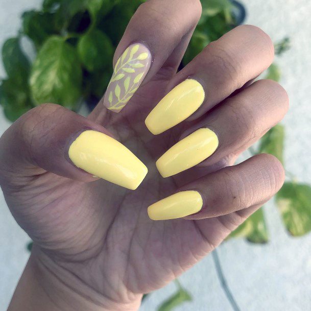 Woman With Fabulous Light Yellow Nail Design