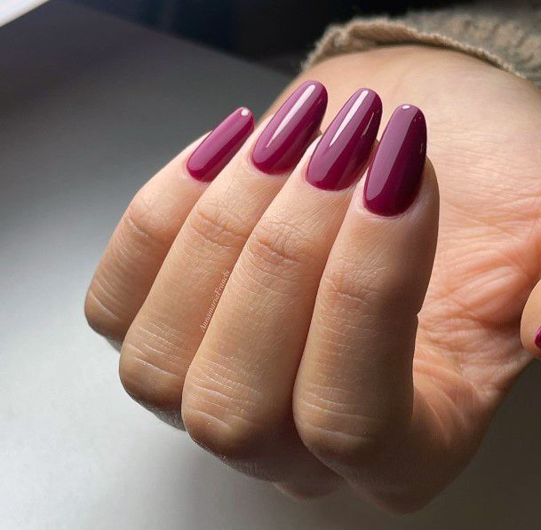 Woman With Fabulous Magenta Nail Design