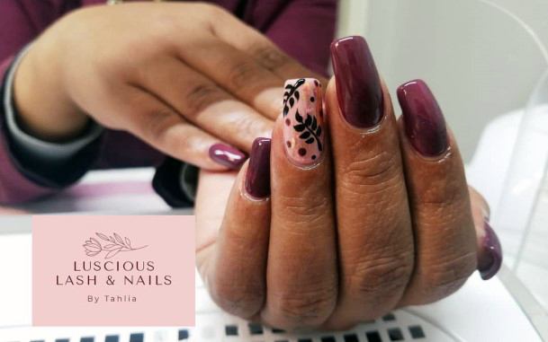 Woman With Fabulous Maroon And Black Nail Design