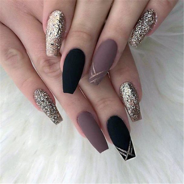 Woman With Fabulous Maroon Dress Nail Design