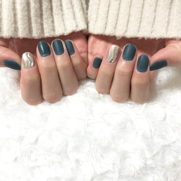 Woman With Fabulous Matte Green Nail Design