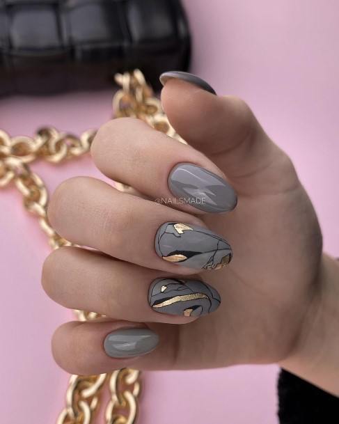 Woman With Fabulous Metallic Gold Nail Design