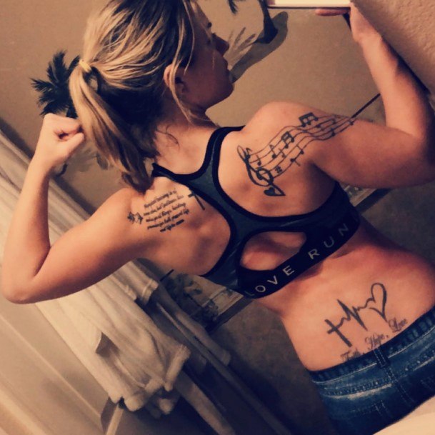 Woman With Fabulous Music Note Tattoo Design