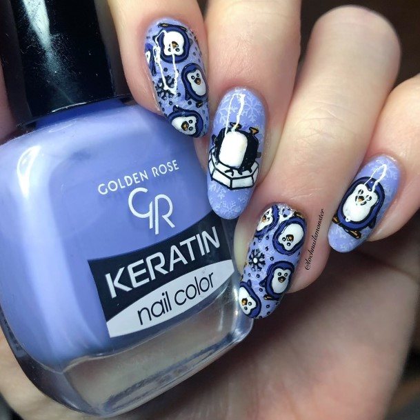 Woman With Fabulous Penguin Nail Design