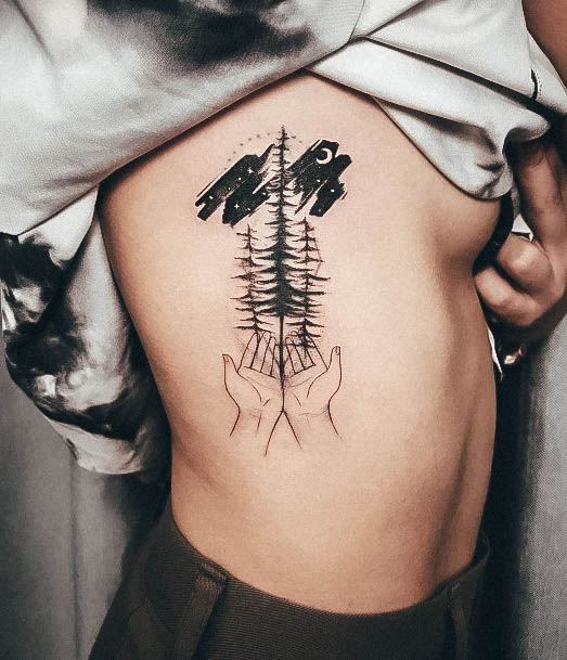 Woman With Fabulous Pine Tree Tattoo Design