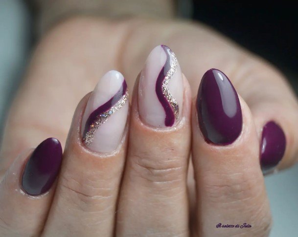 Woman With Fabulous Plum Nail Design