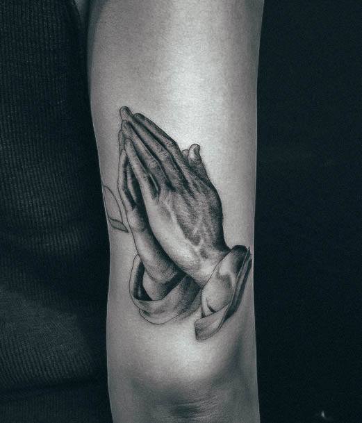 Woman With Fabulous Praying Hands Tattoo Design