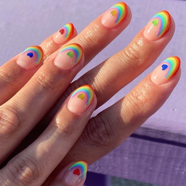 Woman With Fabulous Rainbow Nail Design