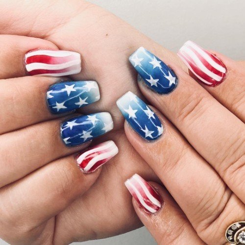 Woman With Fabulous Red And Blue Nail Design