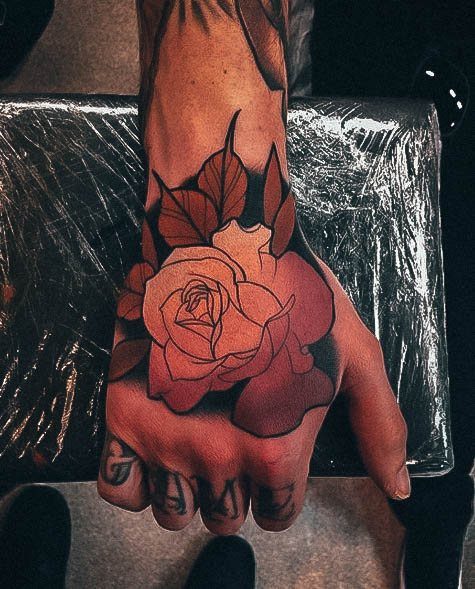 Woman With Fabulous Rose Hand Tattoo Design
