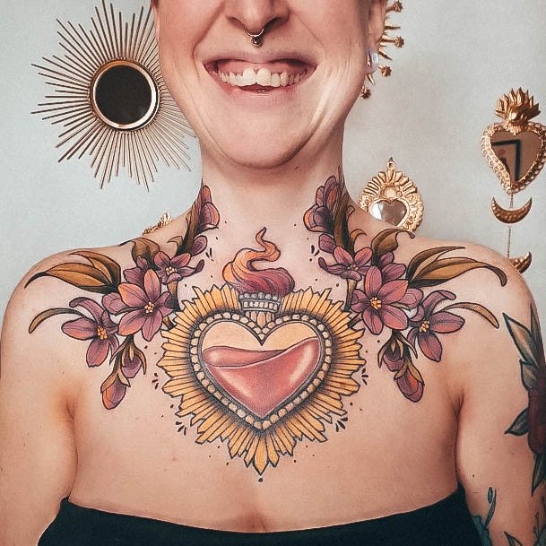 Woman With Fabulous Sacred Heart Tattoo Design