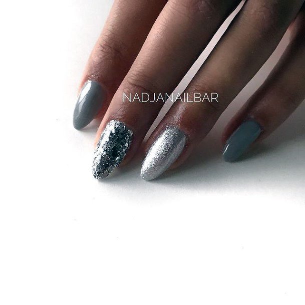 Woman With Fabulous Silver Dress Nail Design